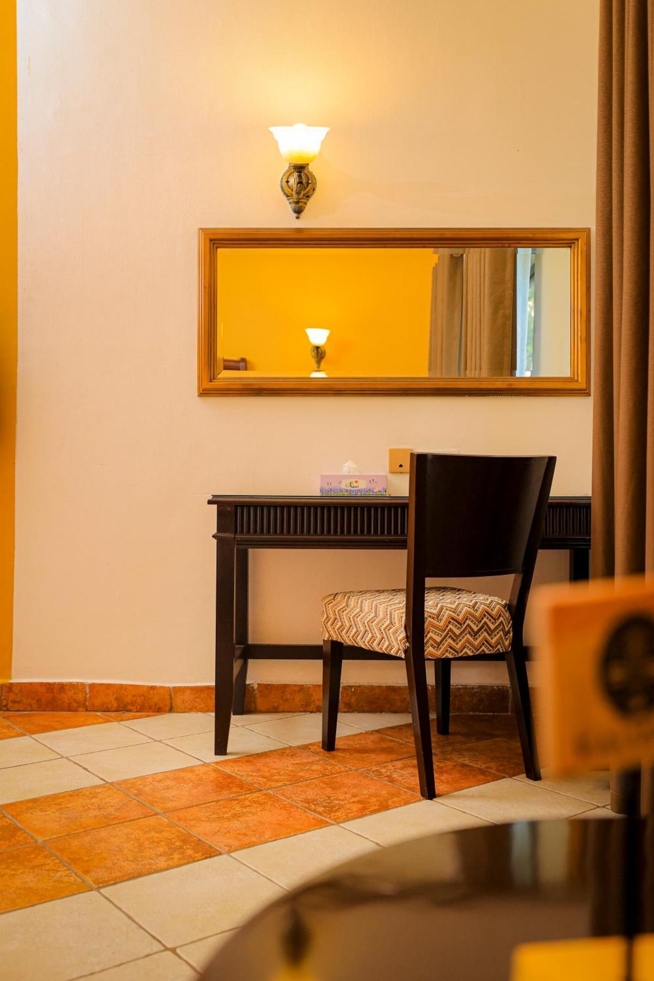 Colosseum Hotel Boutique y Spa Dar es Salaam Habitación foto